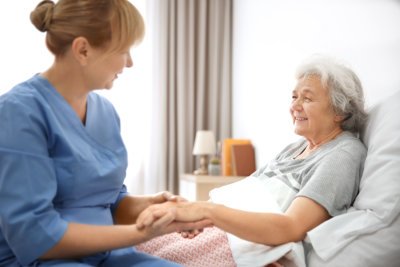 nurse taking care of elderly