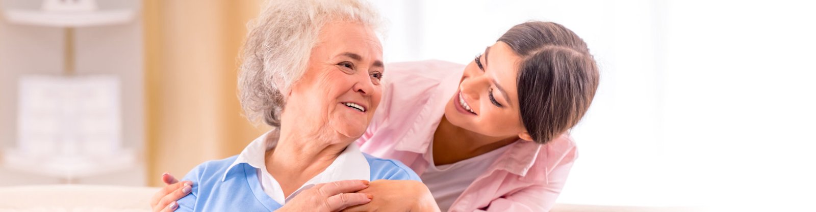 caregiver and elderly talking